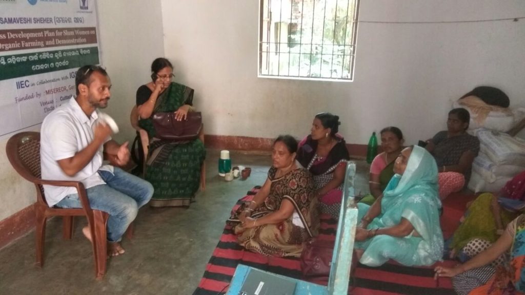 Participants listening attentively of day 2 of urban farming training