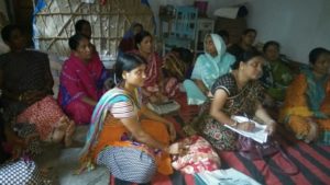 Few participants taking notes on preparation of Panchagavya