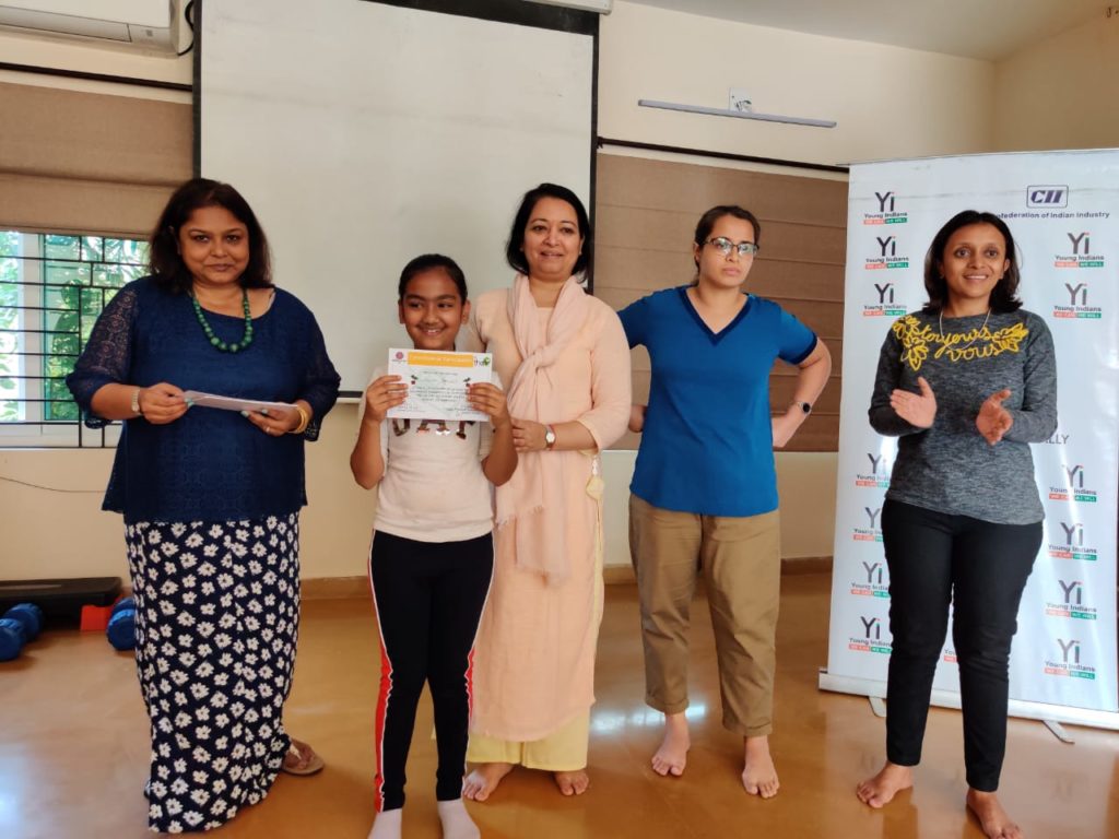 Kids receiving certificates